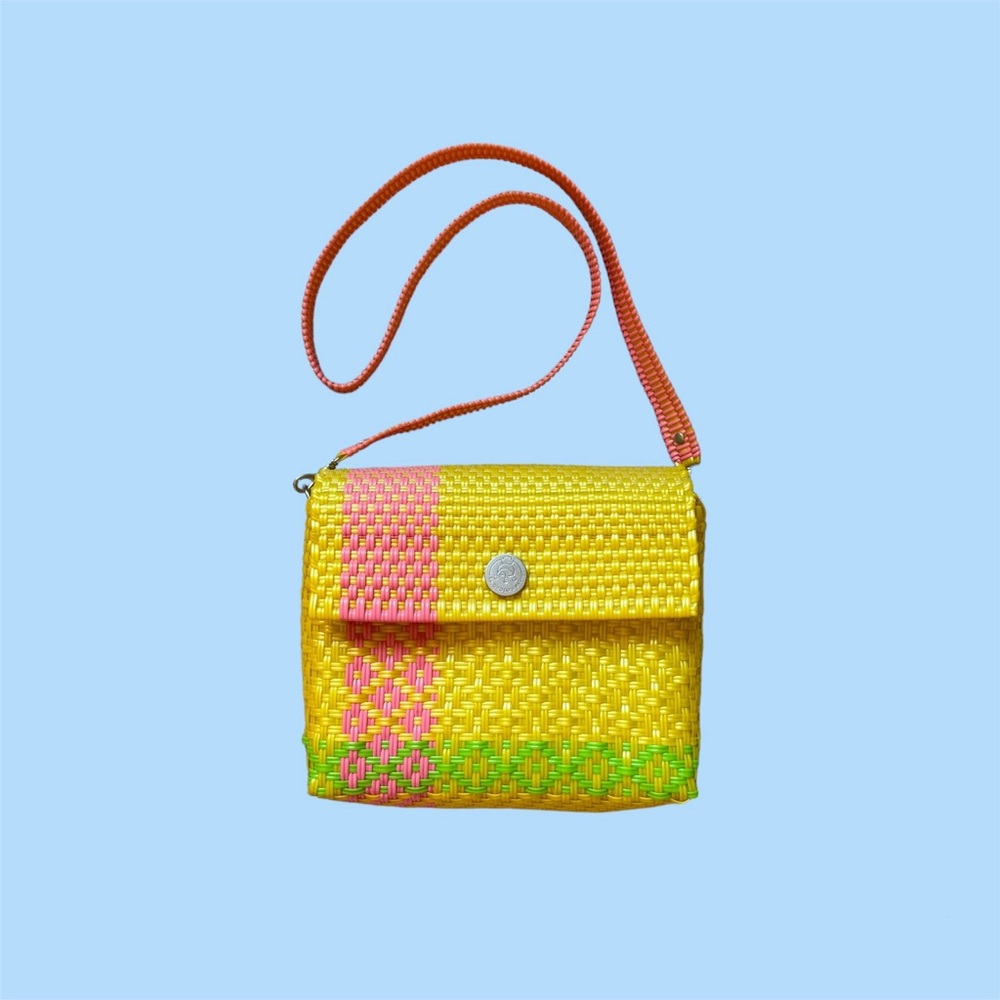 El Cholo’s Kid yellow woven clutch bag